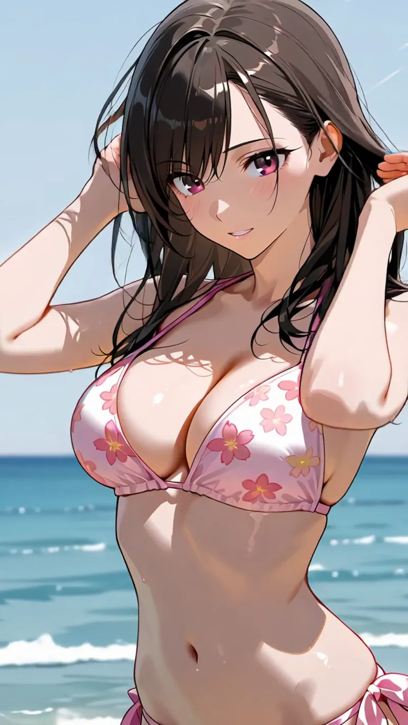 青い海を背景に、黒髪をなびかせた美少女が爽やかな笑顔を見せるポートレート。ピンクの花柄水着姿で、明るい日差しの中での躍動感あふれる表情が印象的です。